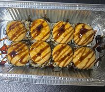 Ролл Запеченный в кунжуте с угрём под сырным соусом