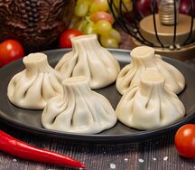 Хинкали с говядиной и зеленью (порция 5штук)