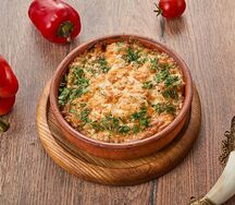 Говядина под сыром в кеци
