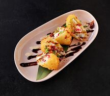 Жареные нэмы с лососем и вялеными томатами