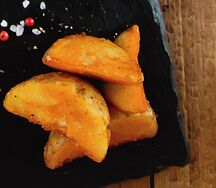 Картофель дольками в специях