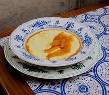Пшенная каша с томленой грушей и пармезаном