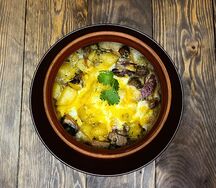 Томлёная говядина с картофелем и грибами