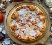 Пицца с ветчиной