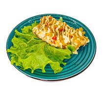 Минтай запеченный с овощами