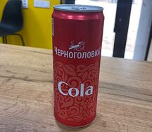 Черноголовка Кола в жестяной банке
