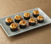 Запеченный ролл с гребешками и угрем