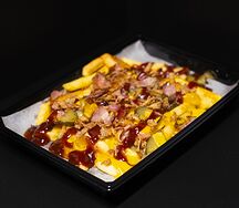 Картофель с беконом в сырном соусе