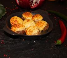 Шампиньоны, запеченные с сыром