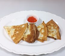 Румяные блинчики с икрой