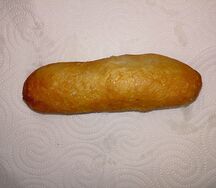 Жареная сосиска в тесте