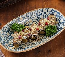 Рулетики из баклажанов с ореховой начинкой