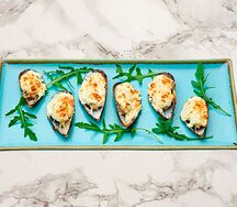 Мидии киви, запеченные под соусом пармезан