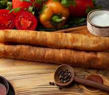 Сосиска в тесте жареная