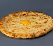 Осетинский пирог с сыром и яйцом
