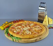 Пицца Мясная с сыром чеддер