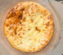 Осетинский пирог Хачапури с сыром и картофелем