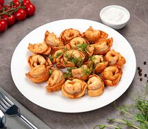 Пельмени жареные