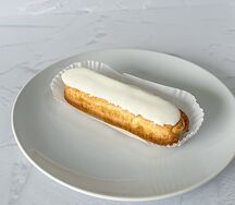 Пирожное Эклер со сливочным вкусом