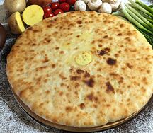 Пирог с сыром и зелёным луком