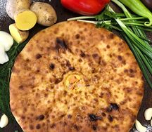 Пирог с осетриной, картофелем и сыром