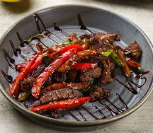 Мясной горячий салат
