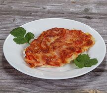 Шницель куриный с помидорами и сыром