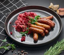 Колбаски Нюрнбергские с бигосом из квашеной капусты