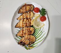 Мидии в ракушках, запечённые в сырном соусе