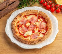 Пицца с ветчиной и сыром