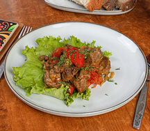 Баранина, жаренная с овощами