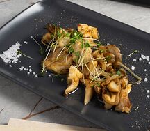 Вешенки, жаренные с луком