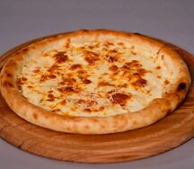 Пицца четыре сыра