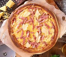 Пицца с ветчиной и грибами