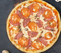 Пицца с ветчиной и грибами