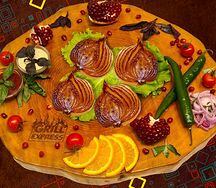 Жареный репчатый лук на углях