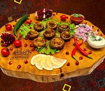 Шампиньоны, жаренные на углях