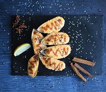 Запеченные мидии в ракушках под соусом Сырный Спайси