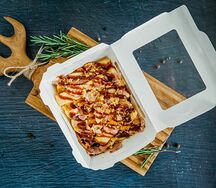 Картофельные дольки с беконом и сыром