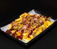 Картофель с беконом в сырном соусе