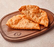 Пара чебуреков с говядиной и свининой