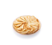 Большая стопка домашних блинов