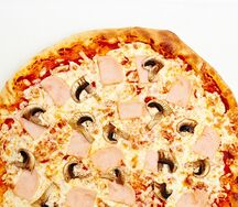 Пицца с ветчиной и грибами