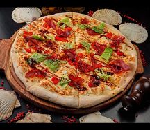 Пицца с вяленой говядиной и печёным перцем