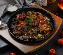 Телятина, утомленная овощами
