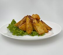Картофель запеченный дольками