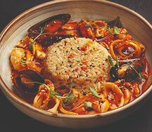 Морепродукты в соусе Том Ям