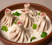 Мини-хинкали с перечным соусом