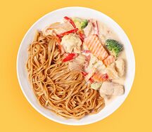 Курица в сливочном соусе с овощами