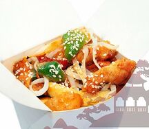 Вок курица в кисло-сладком соусе с овощами